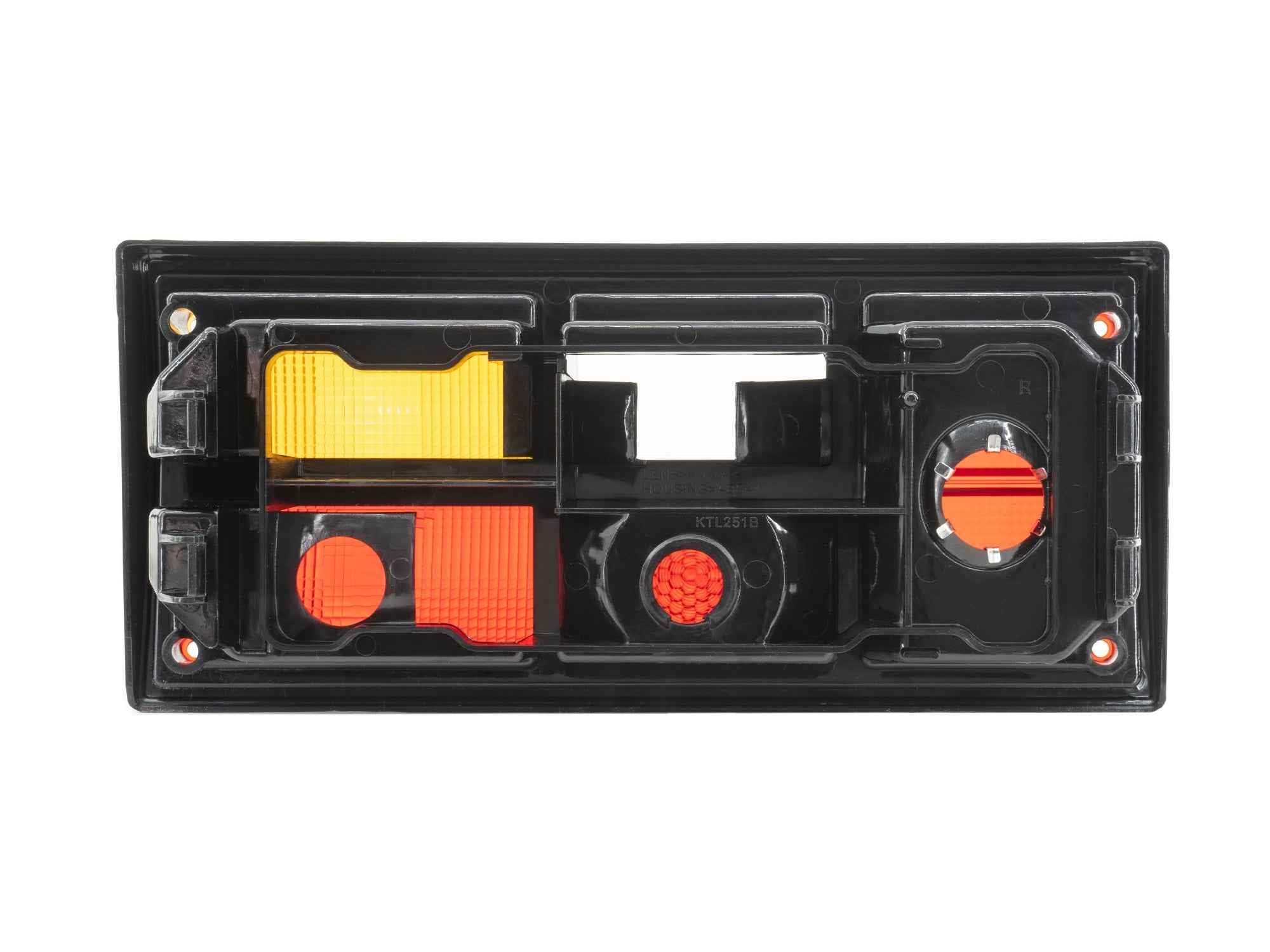 GoWesty passenger tail light lens housing for Vanagon, showcasing the clear lens and housing assembly on a vehicle.