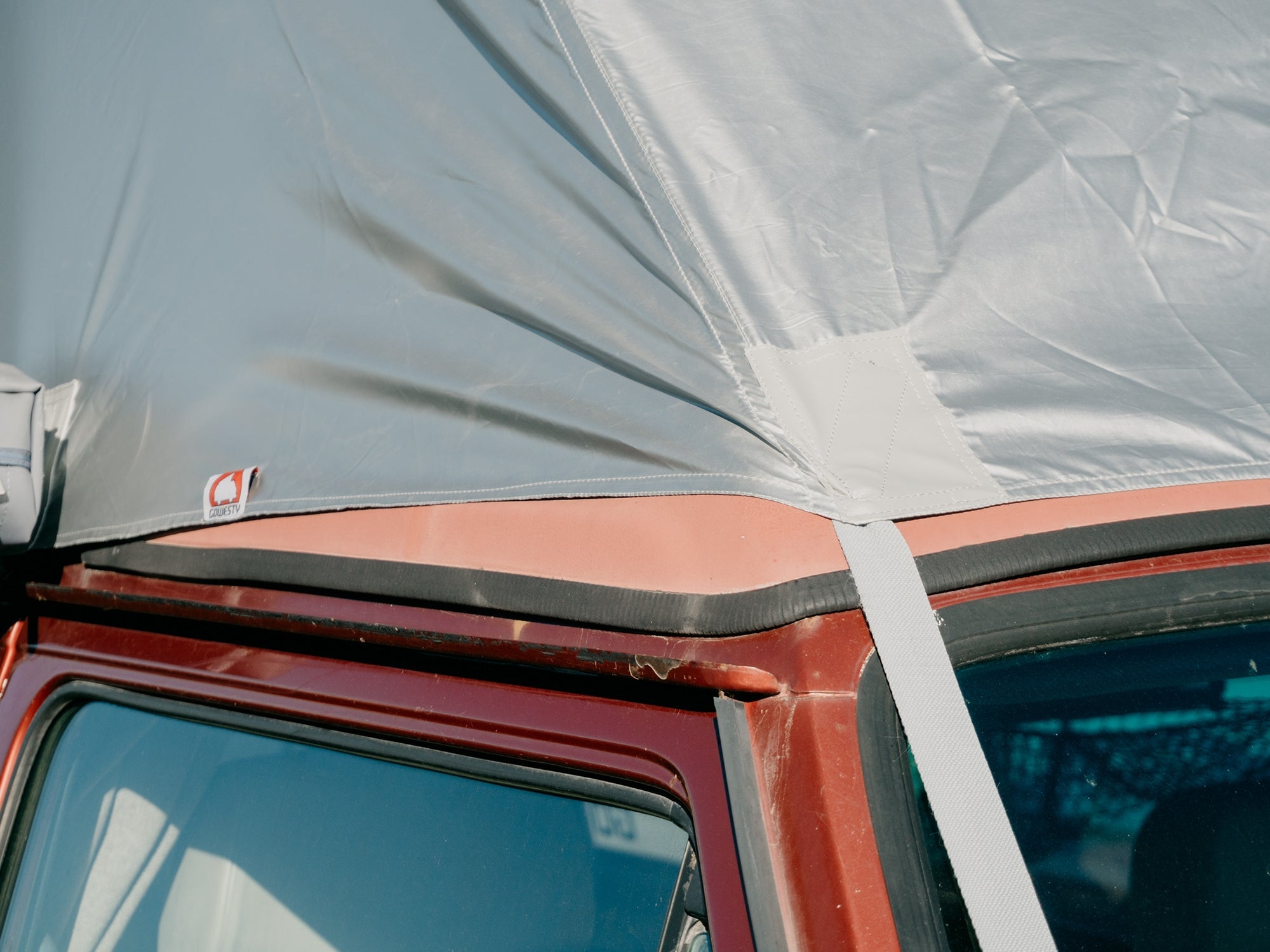 GoWesty Weather-Stopper Pop-Top Fly for Vanagon, full view showing durable fabric and secure attachment for weather protection.