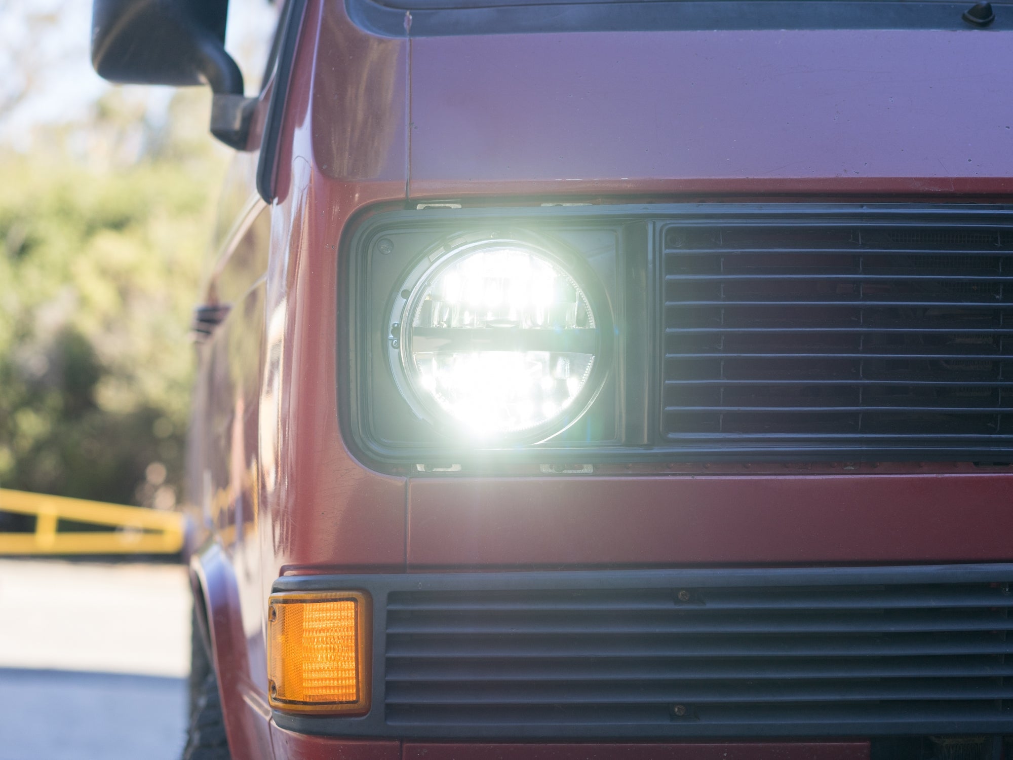 Pair of GoWesty LED headlights showing bright, energy-efficient front lights with clear lens covers and sturdy mounting brackets