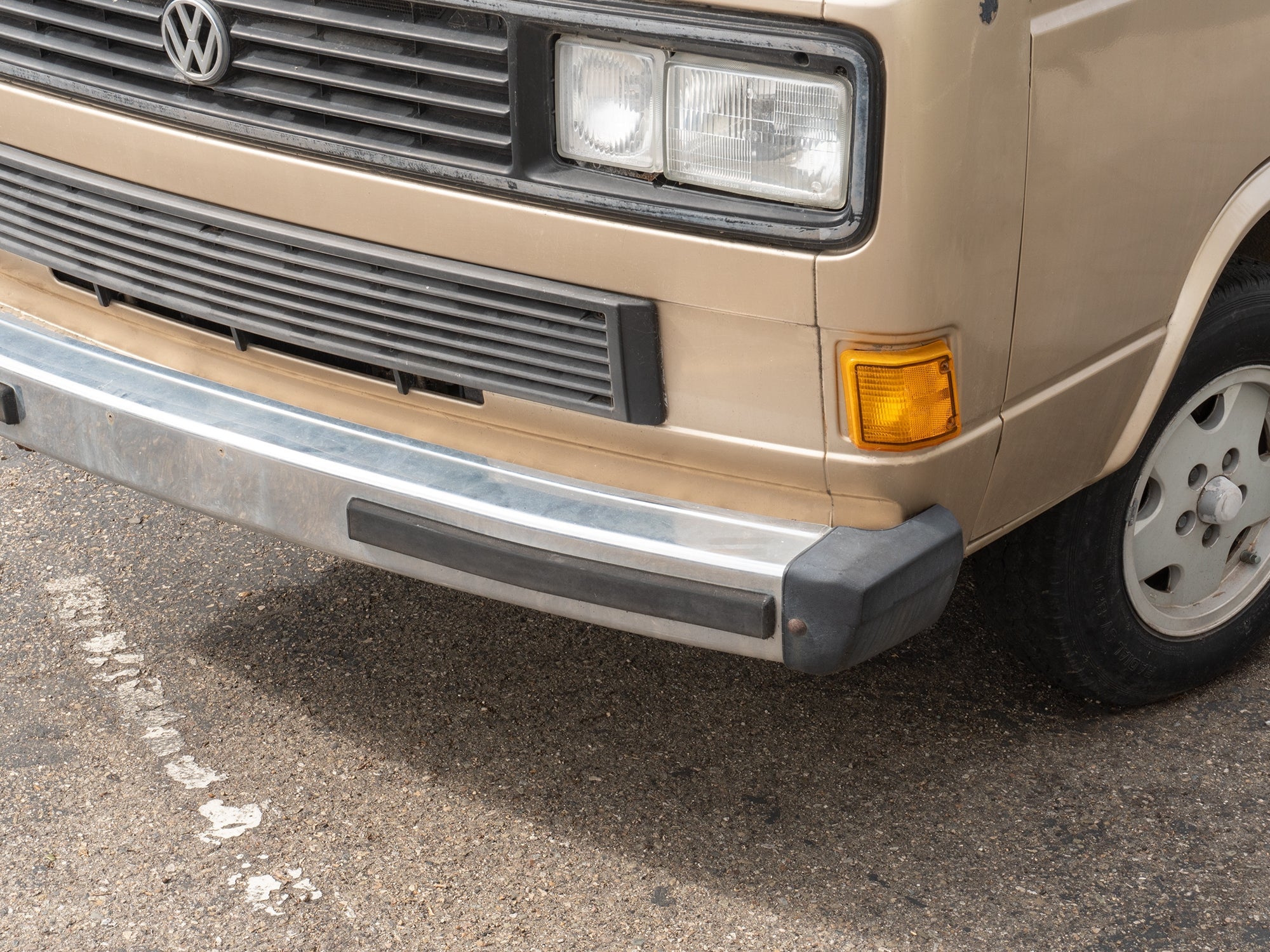 GoWesty front bumper pad strip for Vanagon, driver side, showing the unclassified bumper reinforcement with textured surface.