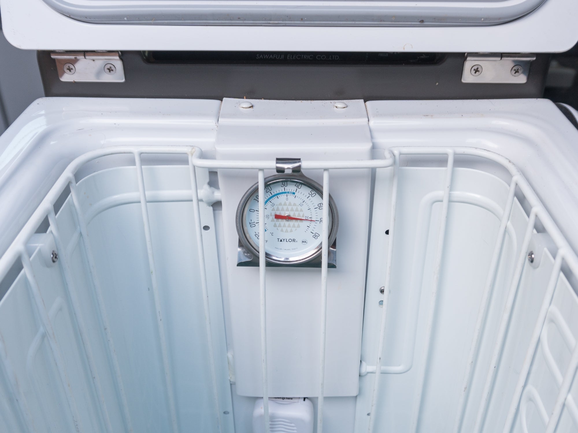 GoWesty freezer and refrigerator dial thermometer showing temperature gauge with clear digital display for accurate cooling monitoring.