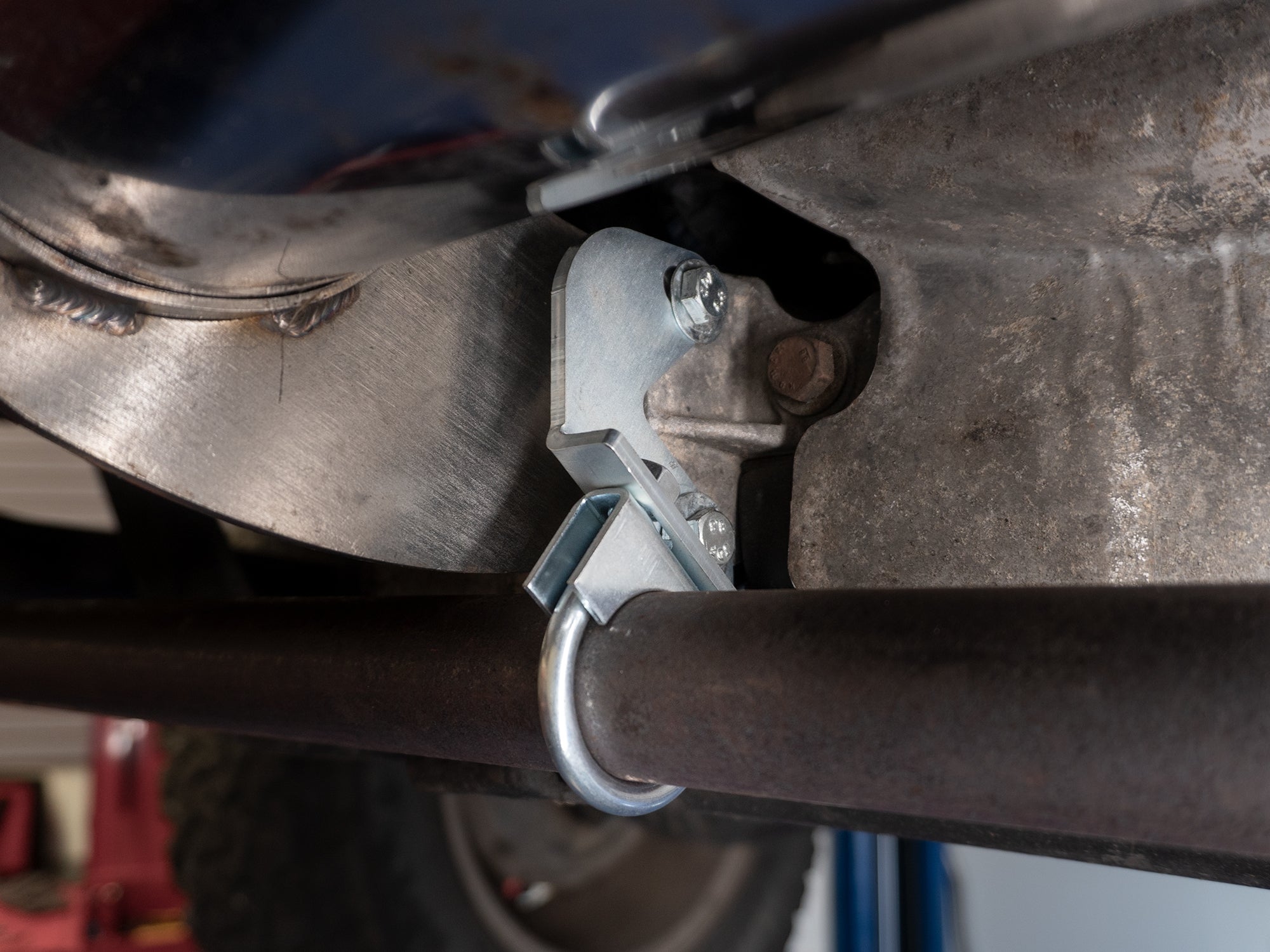 Exhaust Header Support Bracket (Rear) - OVERLANDERS Outfitter