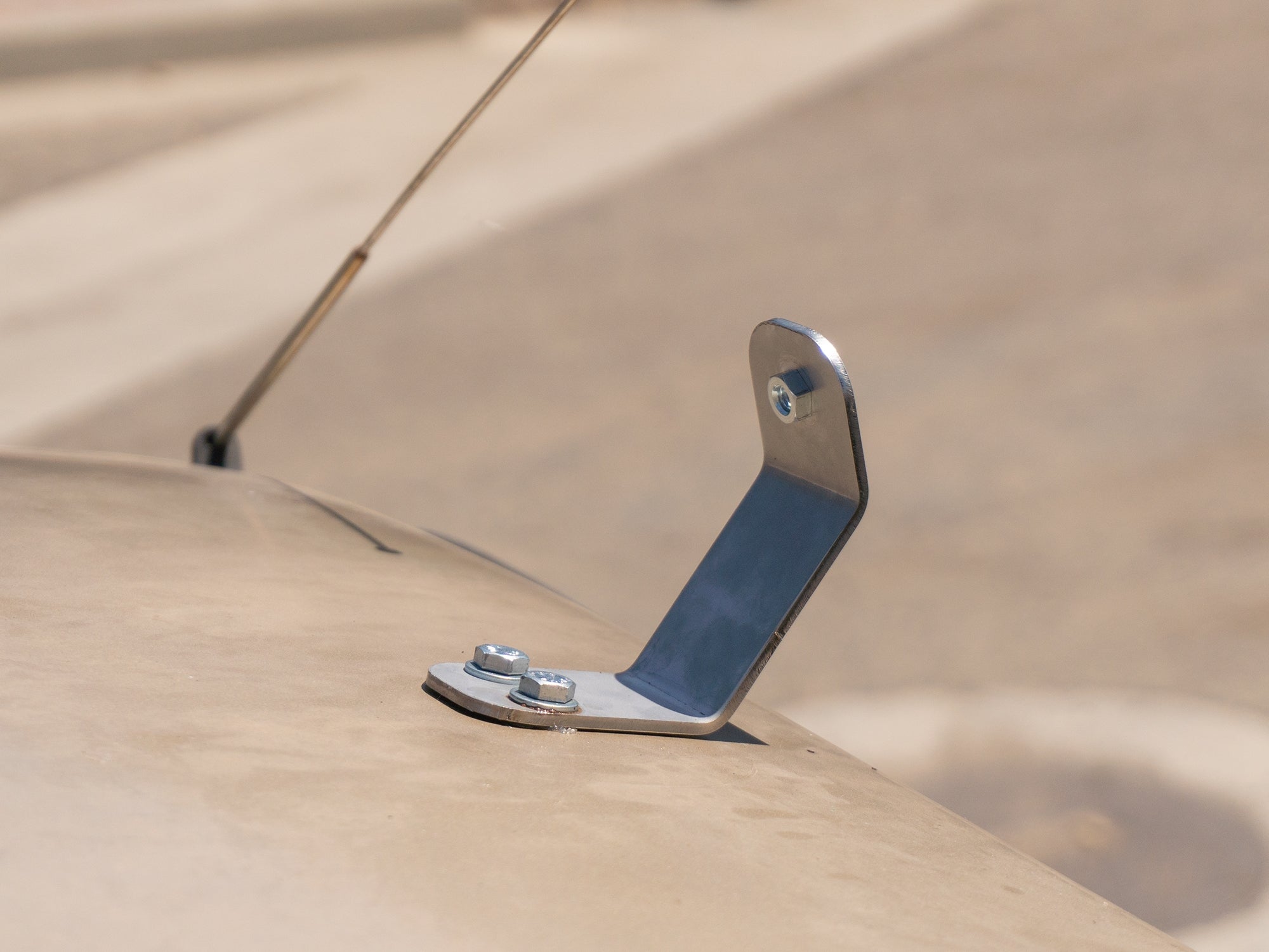 GoWesty Vanagon luggage rack bracket kit showing metal brackets and mounting hardware for Vanagon luggage rack installation.
