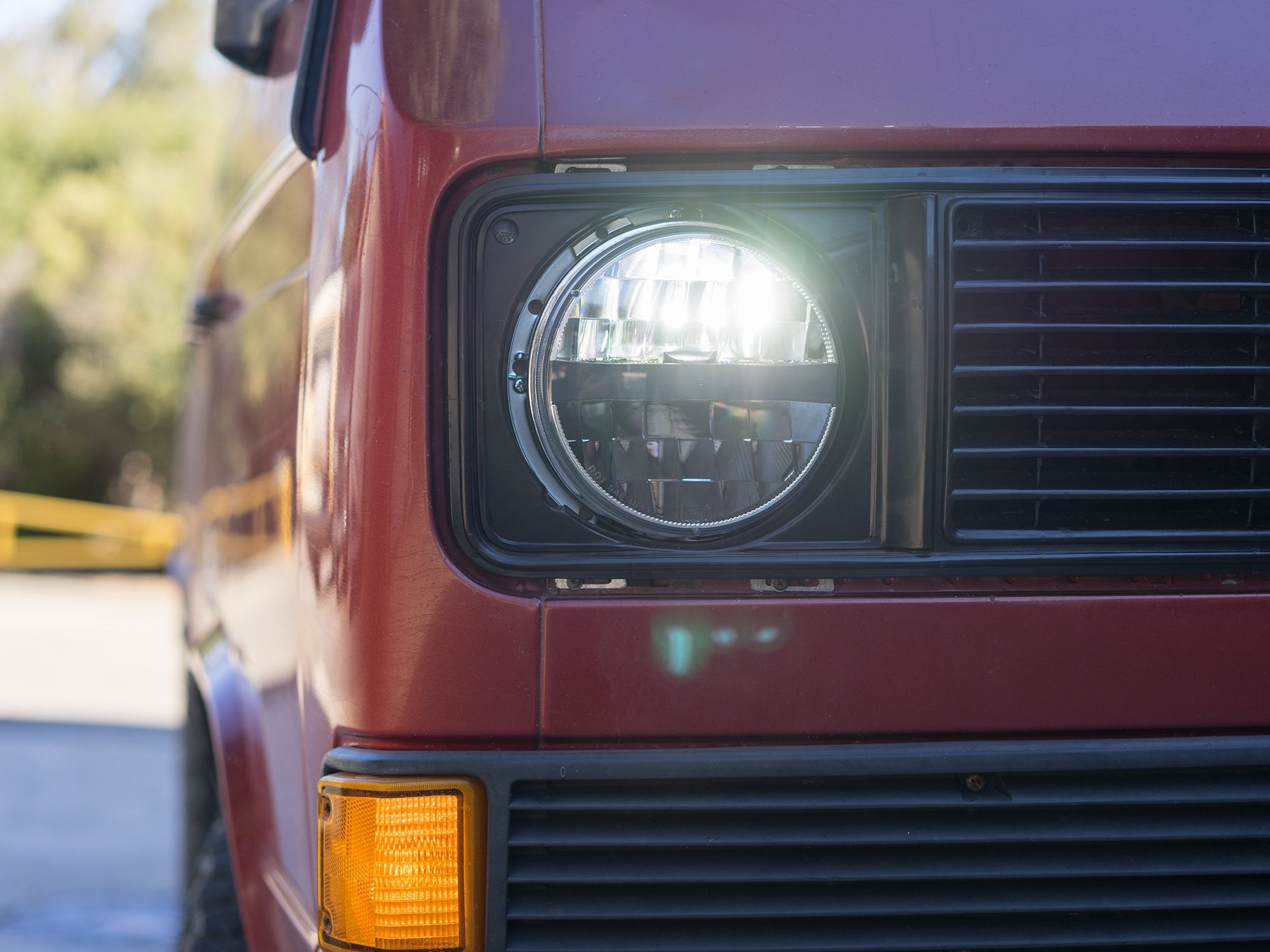 Pair of GoWesty LED headlights showing bright, clear illumination with sleek black housing and modern design.