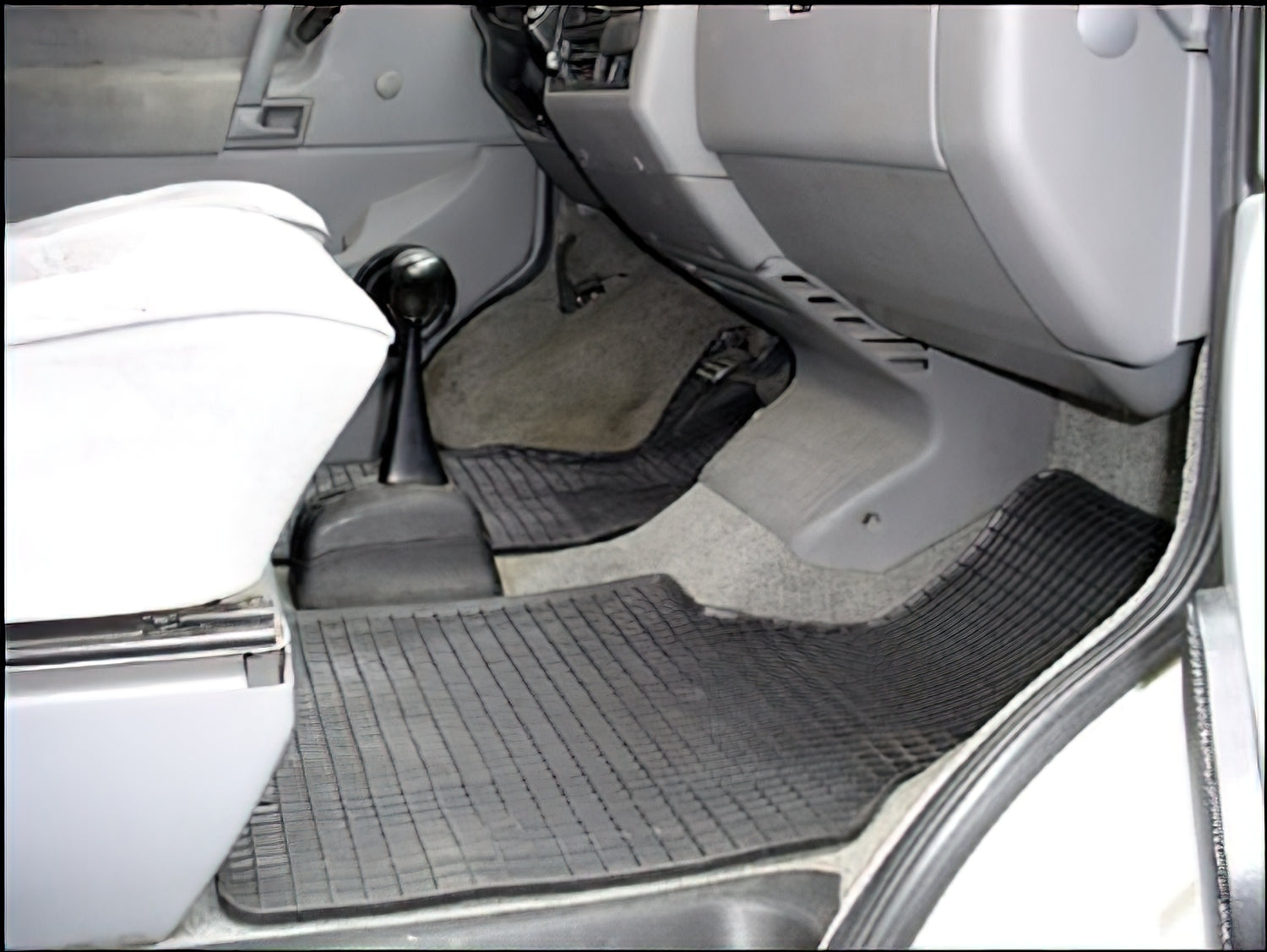 GoWesty Eurovan rubber floor mat set showing textured black mats designed for vehicle interior flooring.