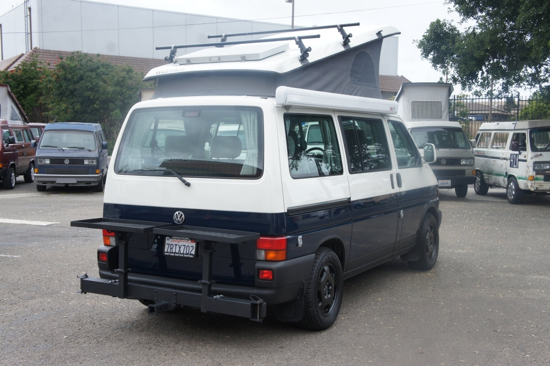 GoWesty Awning Mounting Kit for Eurovan shown with mounting brackets and hardware on vehicle side for easy installation.