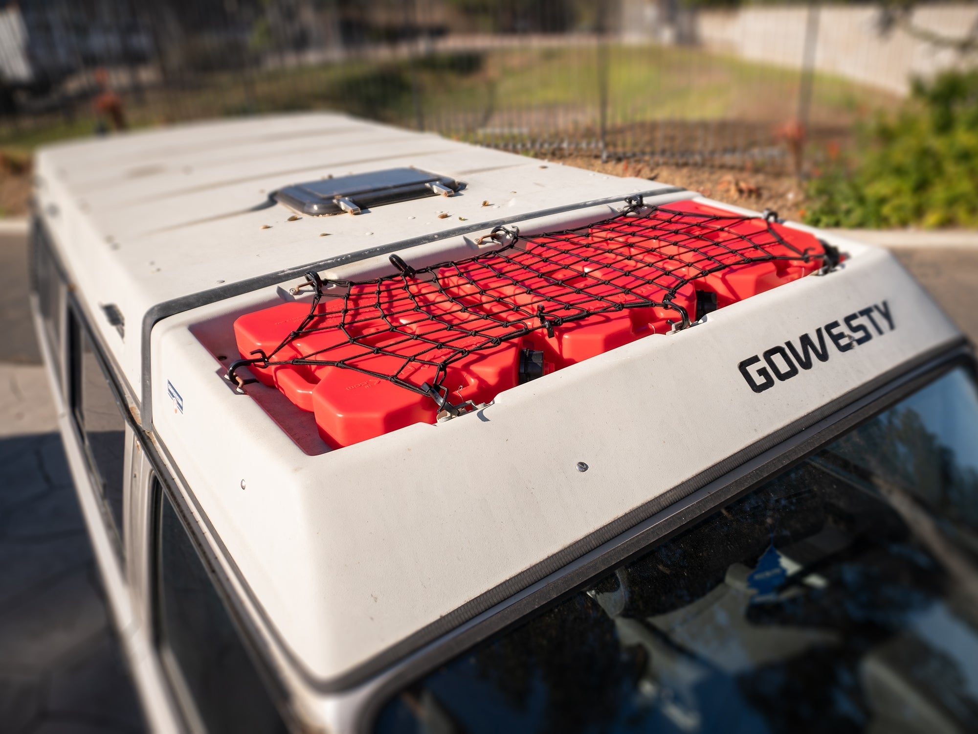GoWesty PowerTye Large Cargo Net spread out, showing its durable mesh design for securing large items in vehicles.