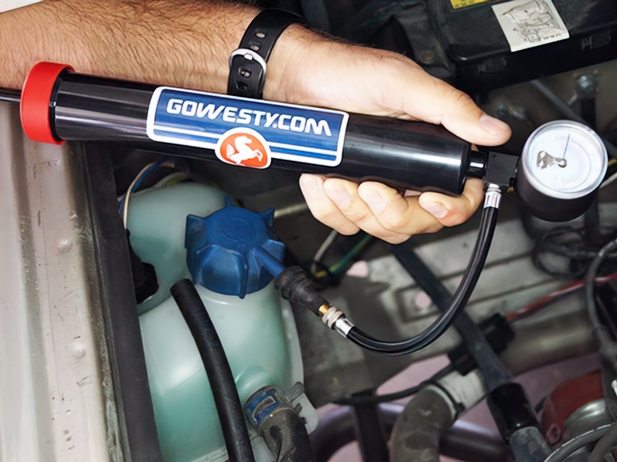 GoWesty cooling system pressurization pump kit for vehicle cooling maintenance, shown with hoses and pump components.