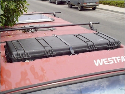 GoWesty locking strap securing luggage rack cargo box for added safety and stability during travel.