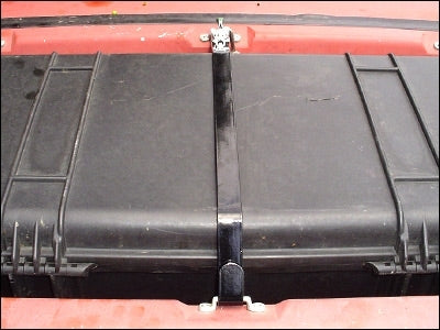 GoWesty locking strap for luggage rack cargo box, exterior accessory showing secure strap and buckle for vehicle cargo security
