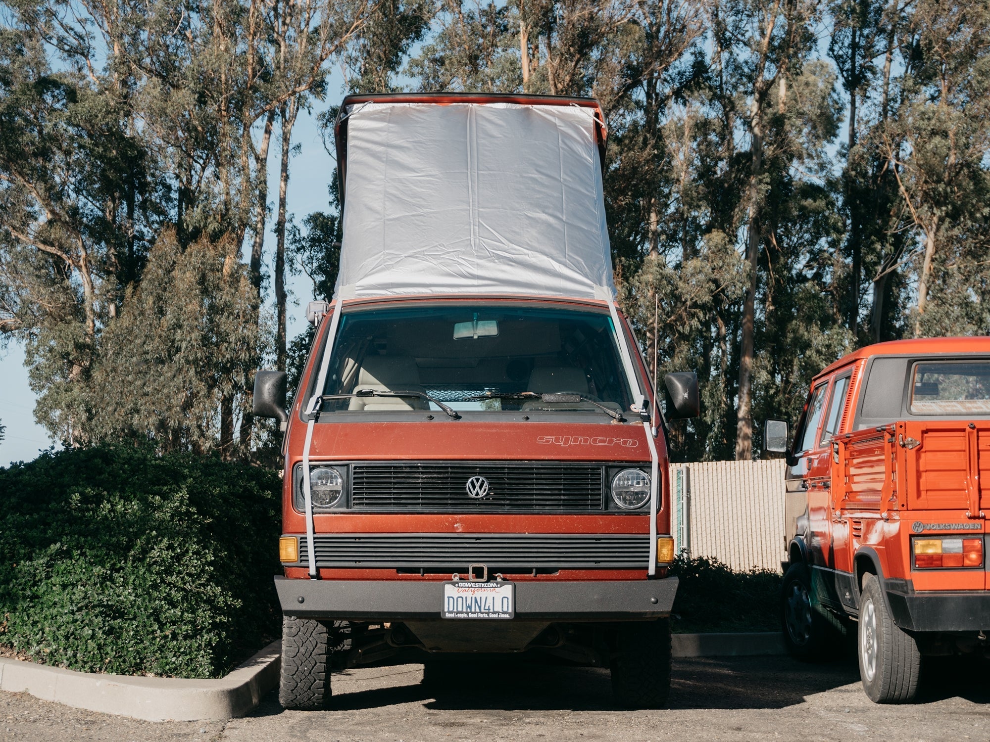 GoWesty Weather-Stopper Pop-Top Fly for Vanagon, durable fabric fly with mesh windows, designed to protect and enhance pop-top ventilation.
