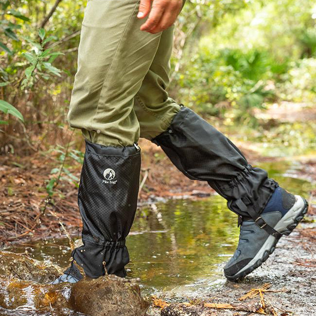 Pike Trail hiking leg gaiters shown on a trail, designed to protect legs from debris and moisture during outdoor hiking adventures.