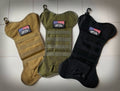Black dog bone tactical Christmas stocking by SFT2 Tactical, featuring a unique design perfect for pet lovers' holiday decor.