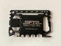 SFT2 Tactical credit card survival tool featuring multiple outdoor survival functions in a compact design.