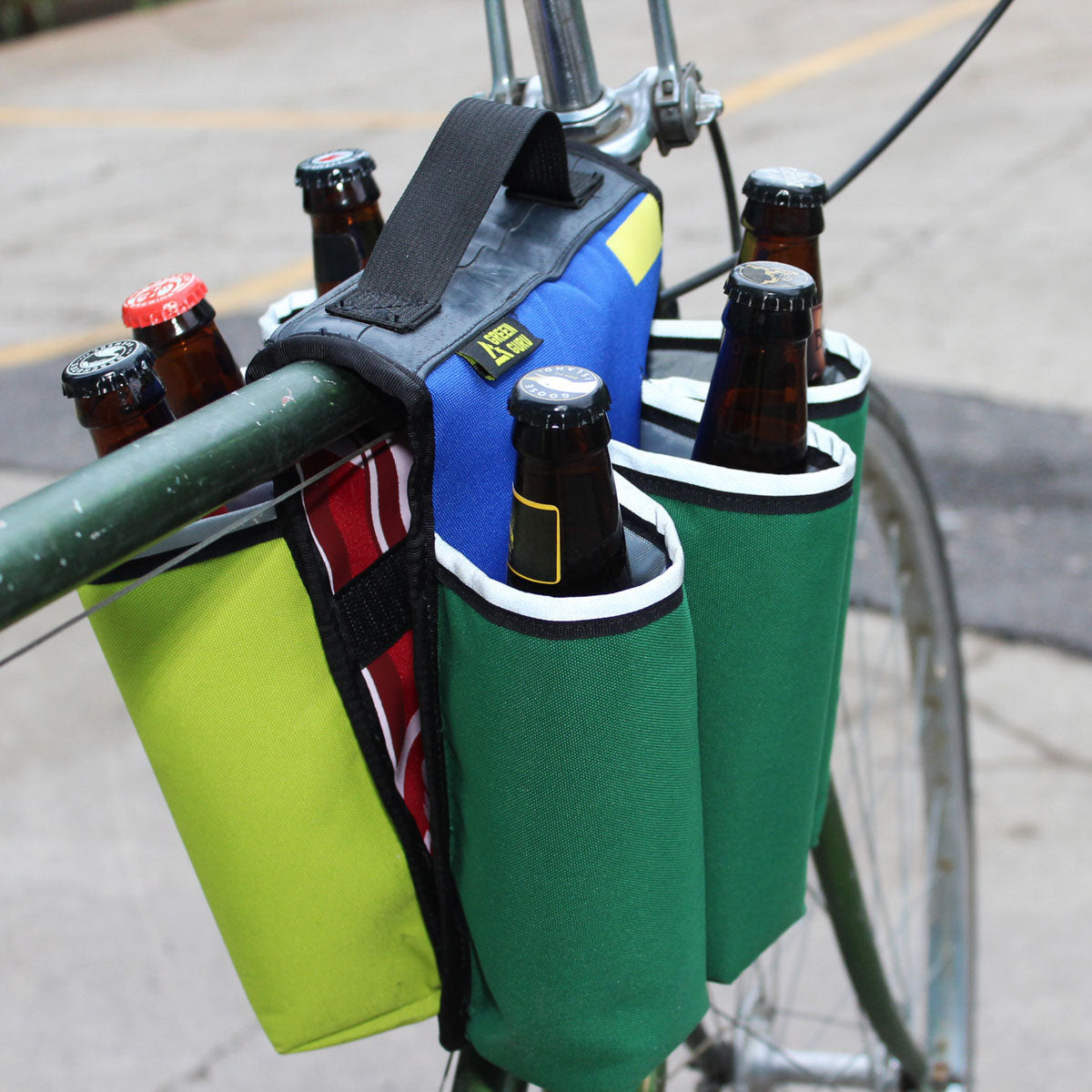 Green Guru Sixer 6-Pack Bottle Holder by ZEITBIKE, multi-color bag designed for carrying bottles on bikes and panniers.
