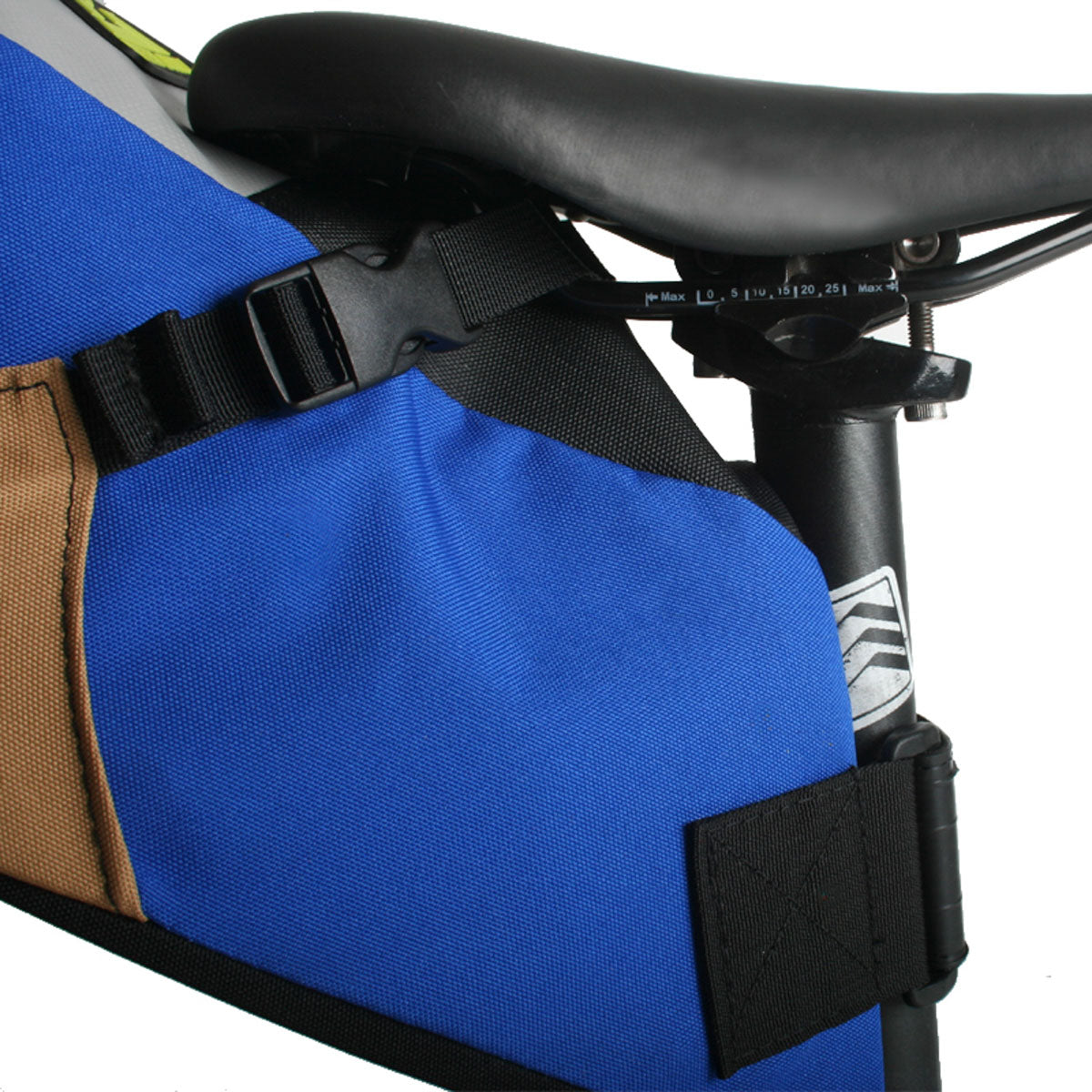 Green Guru Hauler Bike Pack saddle/messenger bag mounted on bike, featuring durable design and vibrant green color.