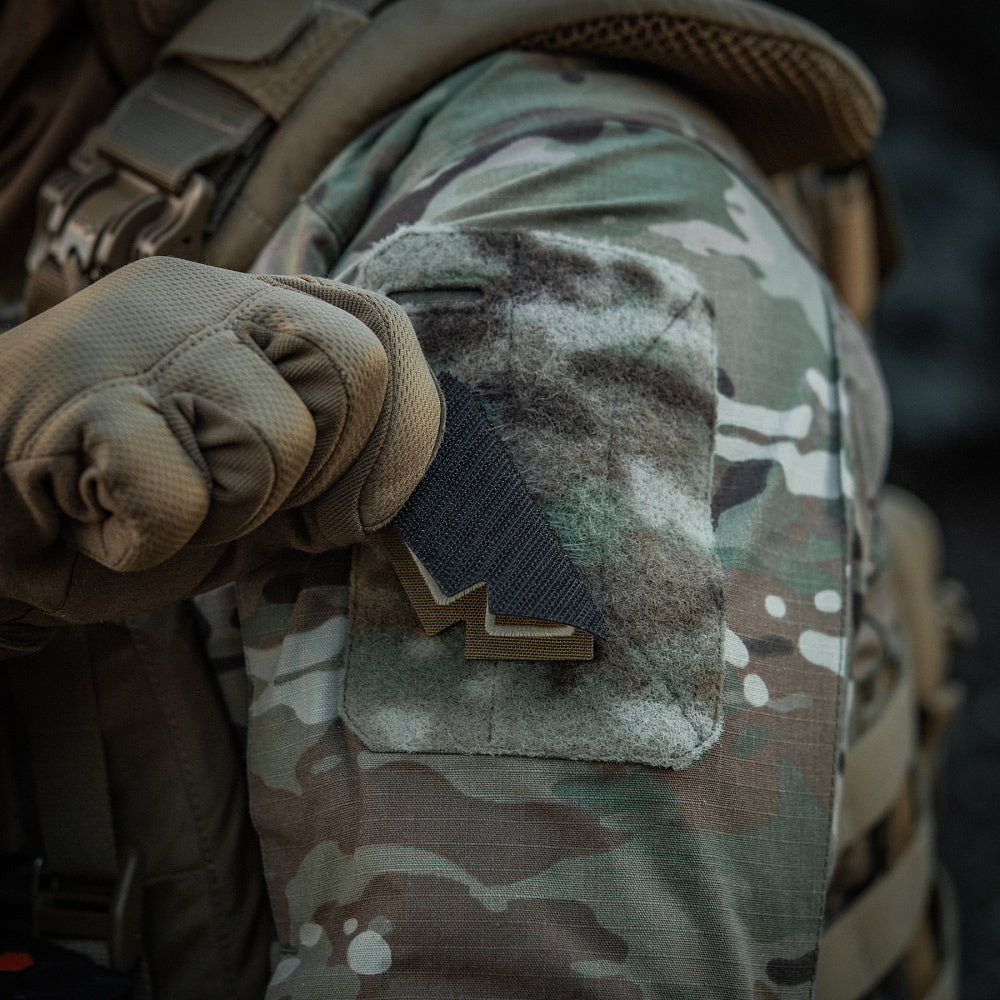 M-TAC Paramedic embroidered patch featuring medical symbols on a durable fabric background.
