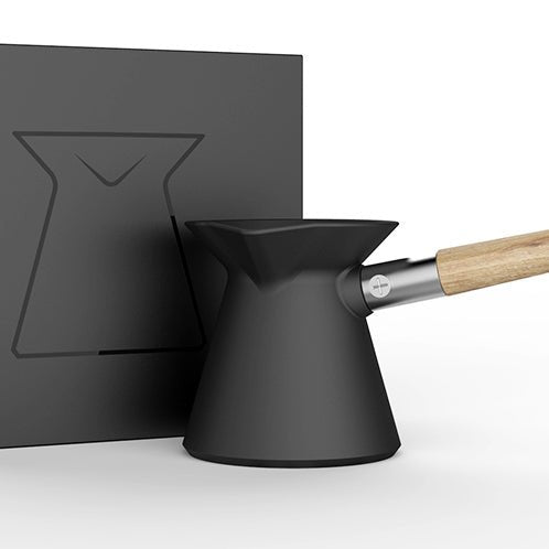 Hakan Coffee Pot by Tea + Linen, stainless steel pour-over coffee maker with a sleek design and ergonomic handle.