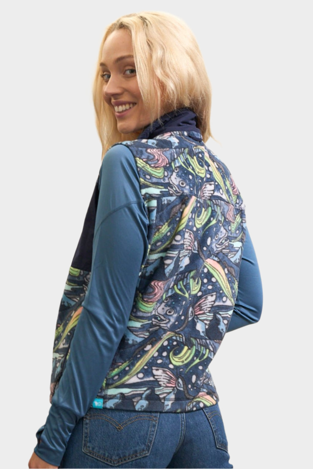 FisheWear HaliBorealis fleece vest featuring a cozy fleece fabric in vibrant colors, ideal for outdoor layering.