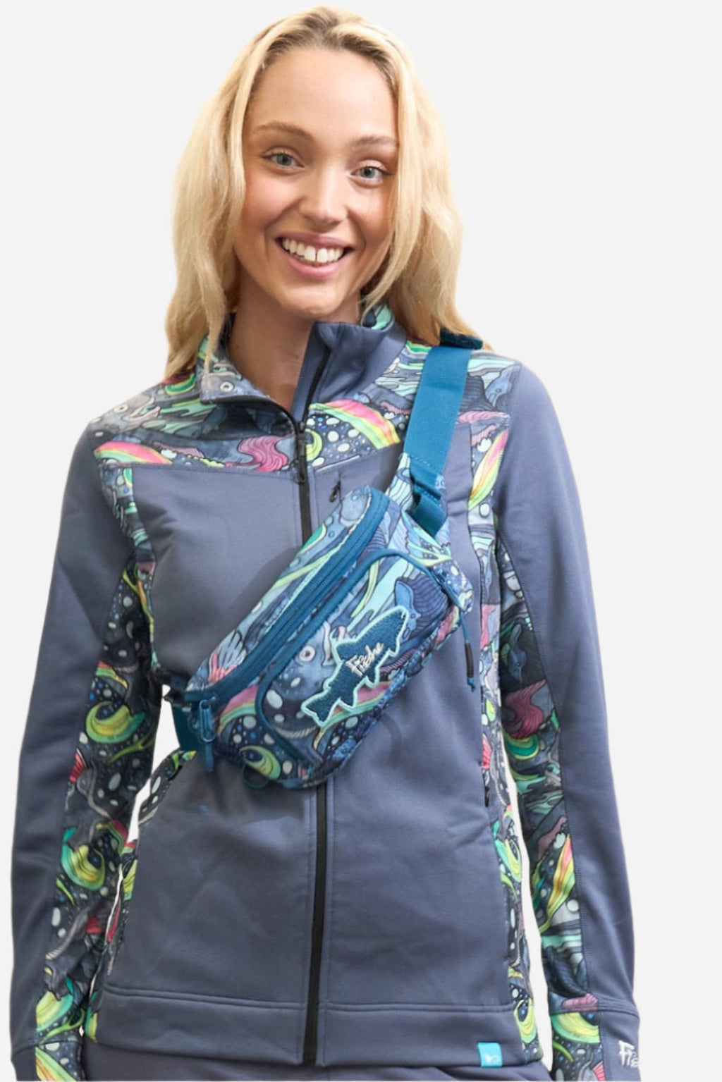 FisheWear HaliBorealis Midlayer Jacket, a lightweight outdoor jacket with a zip-up front and insulated design for cold weather.