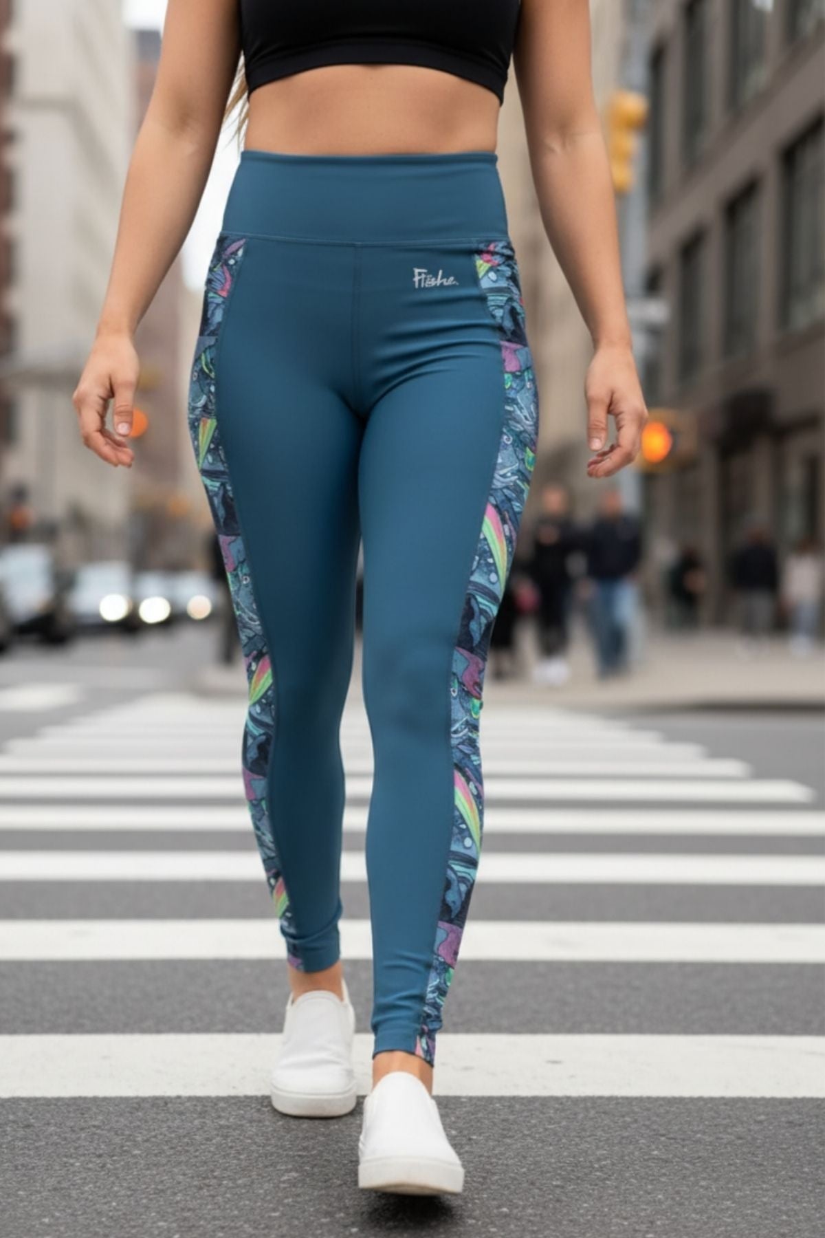 FisheWear HaliBorealis Pocket Leggings with side pockets, featuring a vibrant, colorful pattern on stretchy, comfortable fabric.
