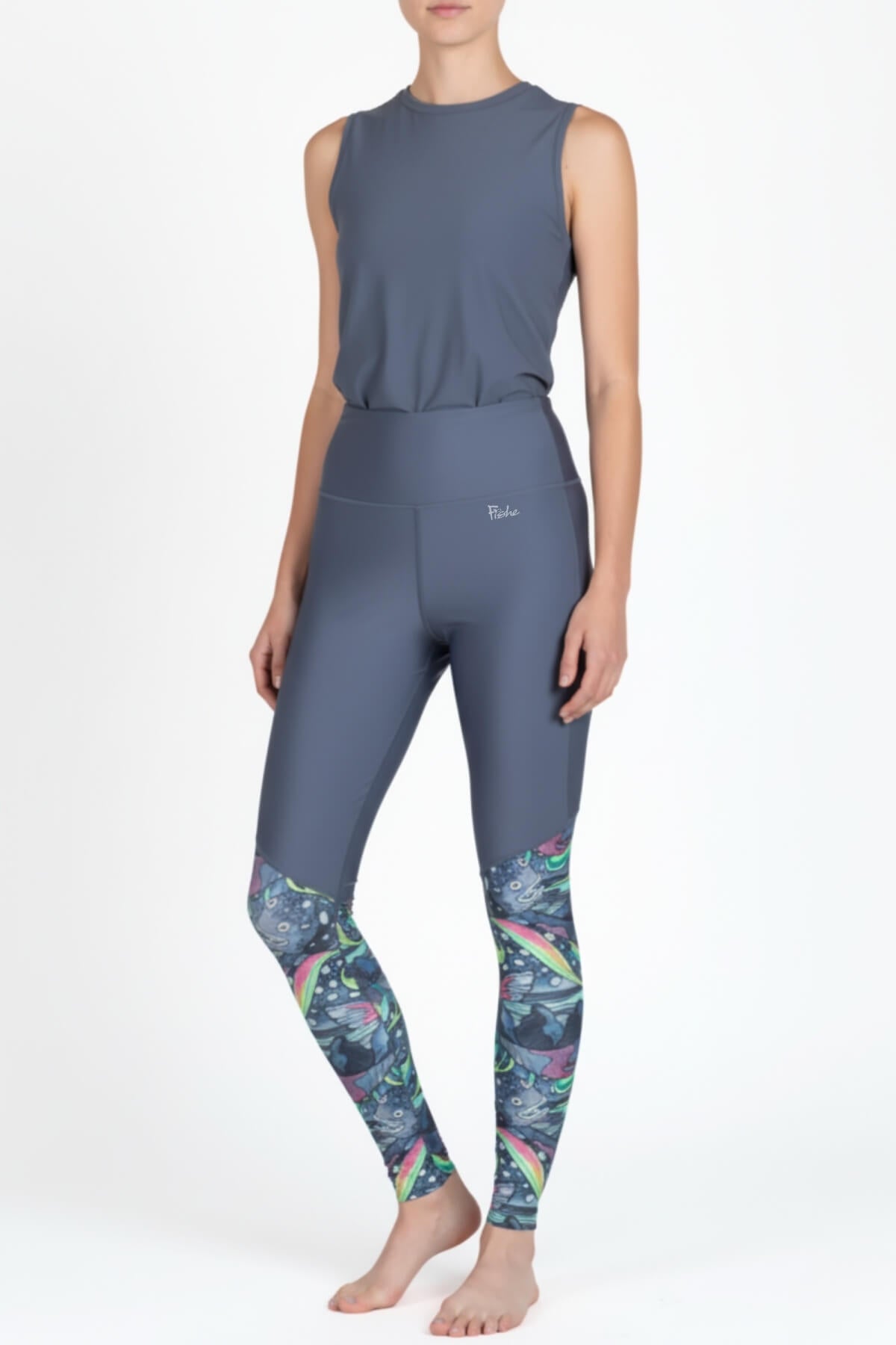 FisheWear HaliBorealis Thermal Active Leggings in dark color, stretchy and insulated for cold weather outdoor activities.