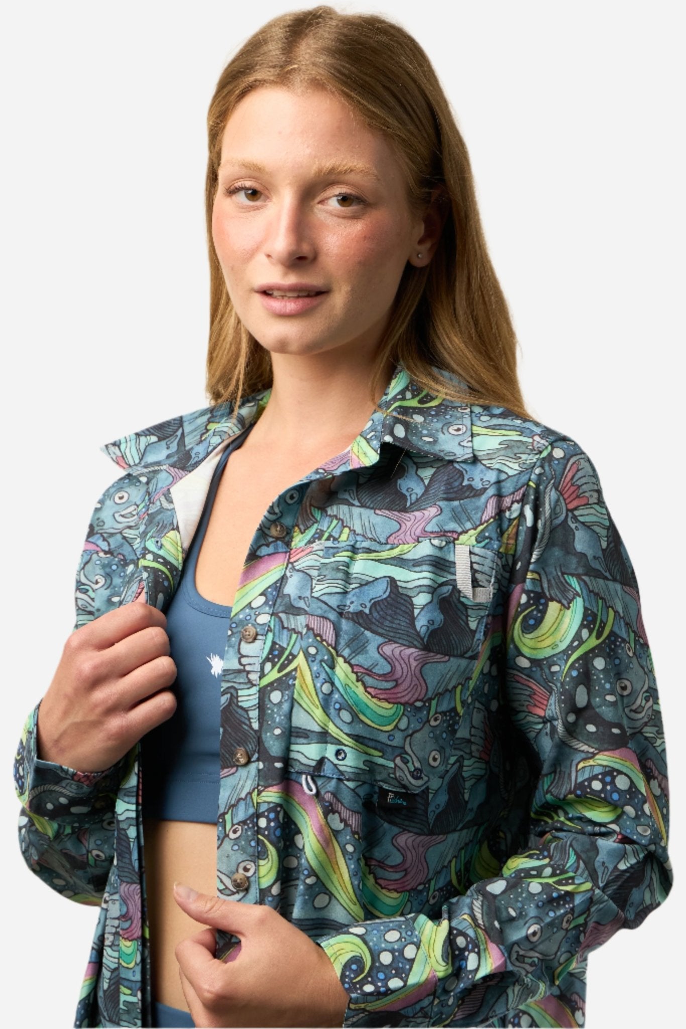 FisheWear HaliBorealis Tunic fishing shirt with long sleeves, lightweight fabric, and outdoor fishing design.