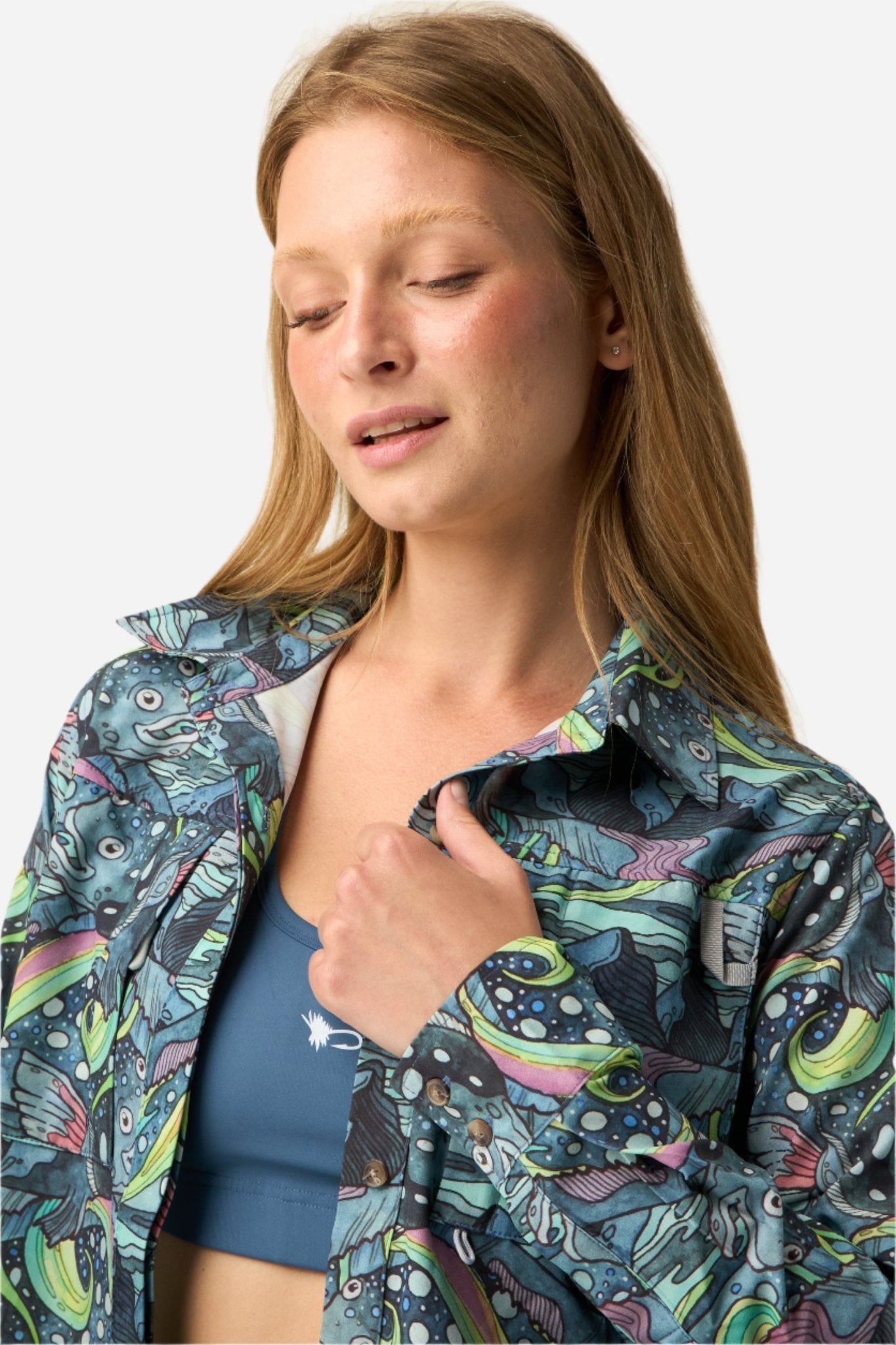 FisheWear HaliBorealis Tunic Fishing Shirt in lightweight fabric, featuring a vibrant pattern and long sleeves for sun protection.