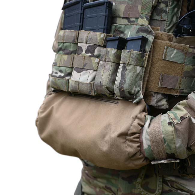 HCC Tactical hand warmer in use outdoors, showcasing its compact design and durable fabric for tactical applications.