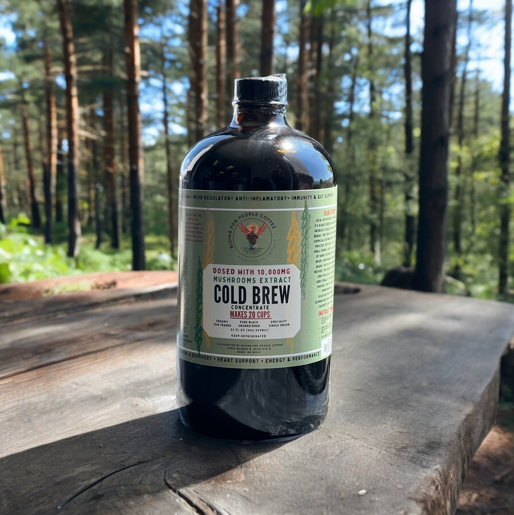 Happy Mushroom concentrated Cold Brew coffee from Rising For People Coffee Co. in a glass bottle with a label.
