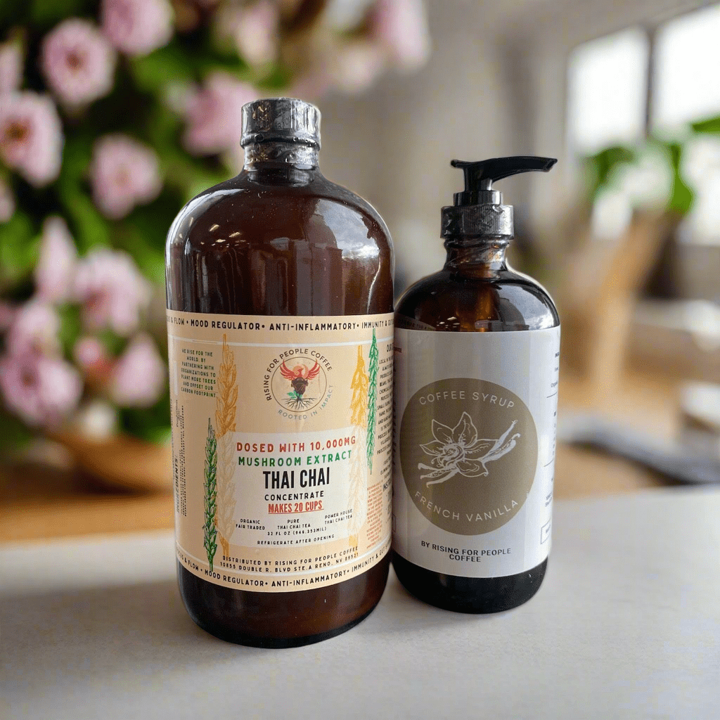 Bottle of Rising For People Coffee Co. Happy Mushroom Thai Chai and French Vanilla Syrup, ideal for coffee flavoring.