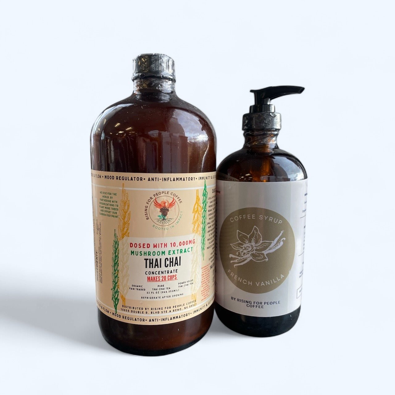 Bottle of Rising For People Coffee Co. Happy Mushroom Thai Chai and French Vanilla syrup for coffee drinks, with colorful label design.