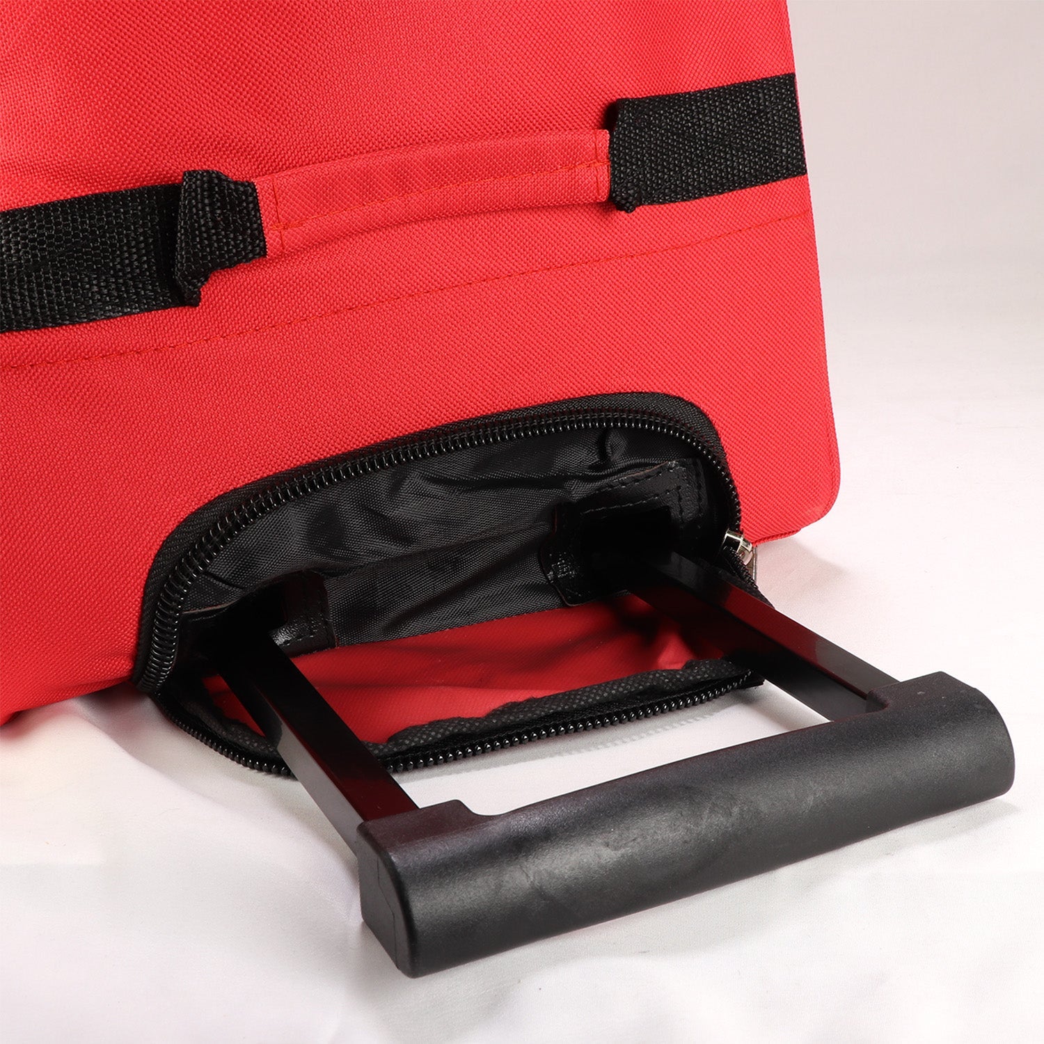 Durable rolling duffel bag with telescoping handle and wheels, made of 600D fabric for travel and gear storage.