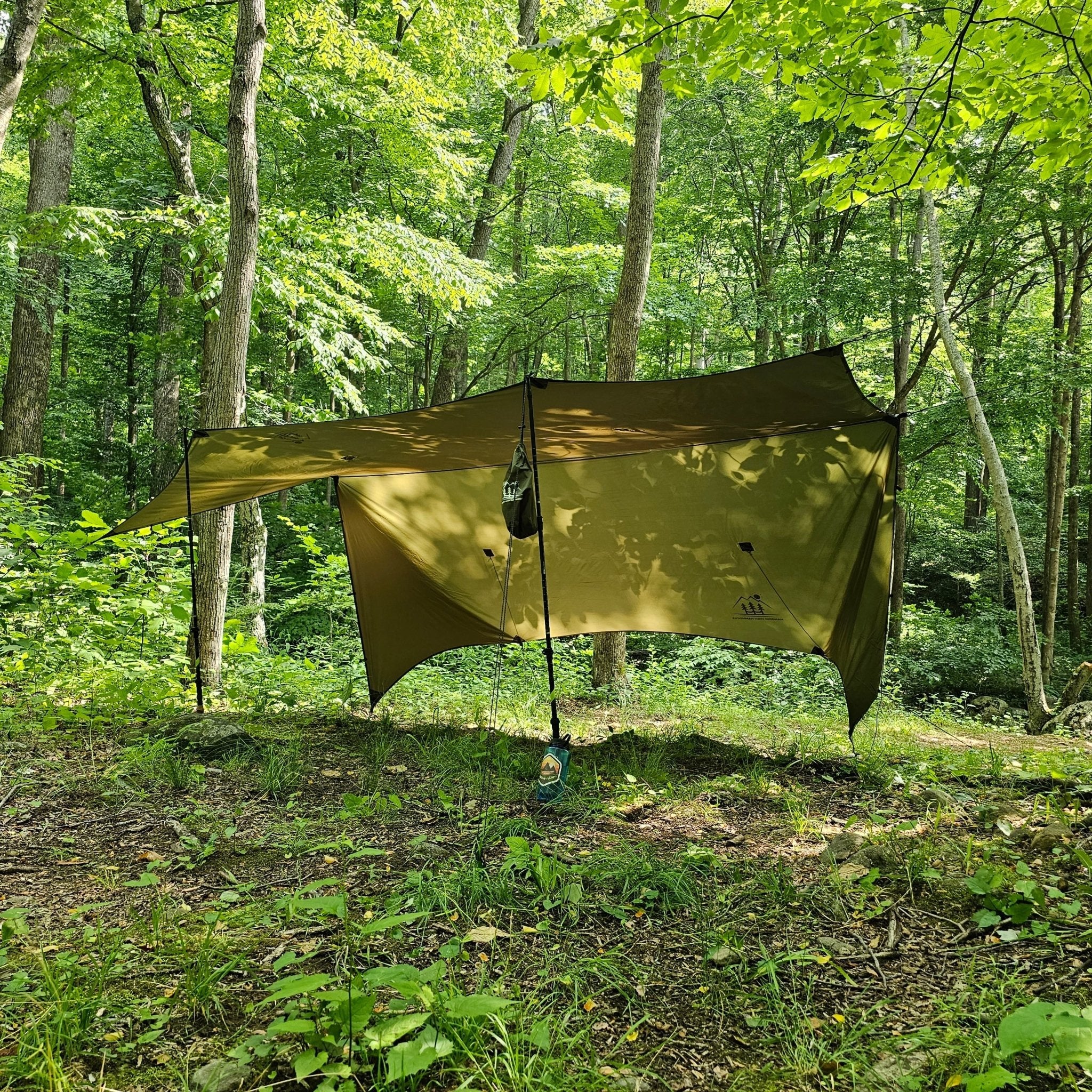 Hanging High Hammocks 12-foot Hideaway Tarp for hammock camping, waterproof rain tarp with adjustable setup for outdoor shelter.