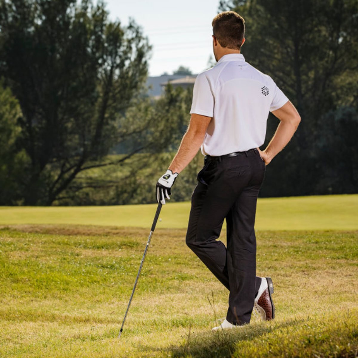 White and black HIRZL Trust Control 2.0 golf gloves by ZEITBIKE, showing the textured palm and snug fit design.