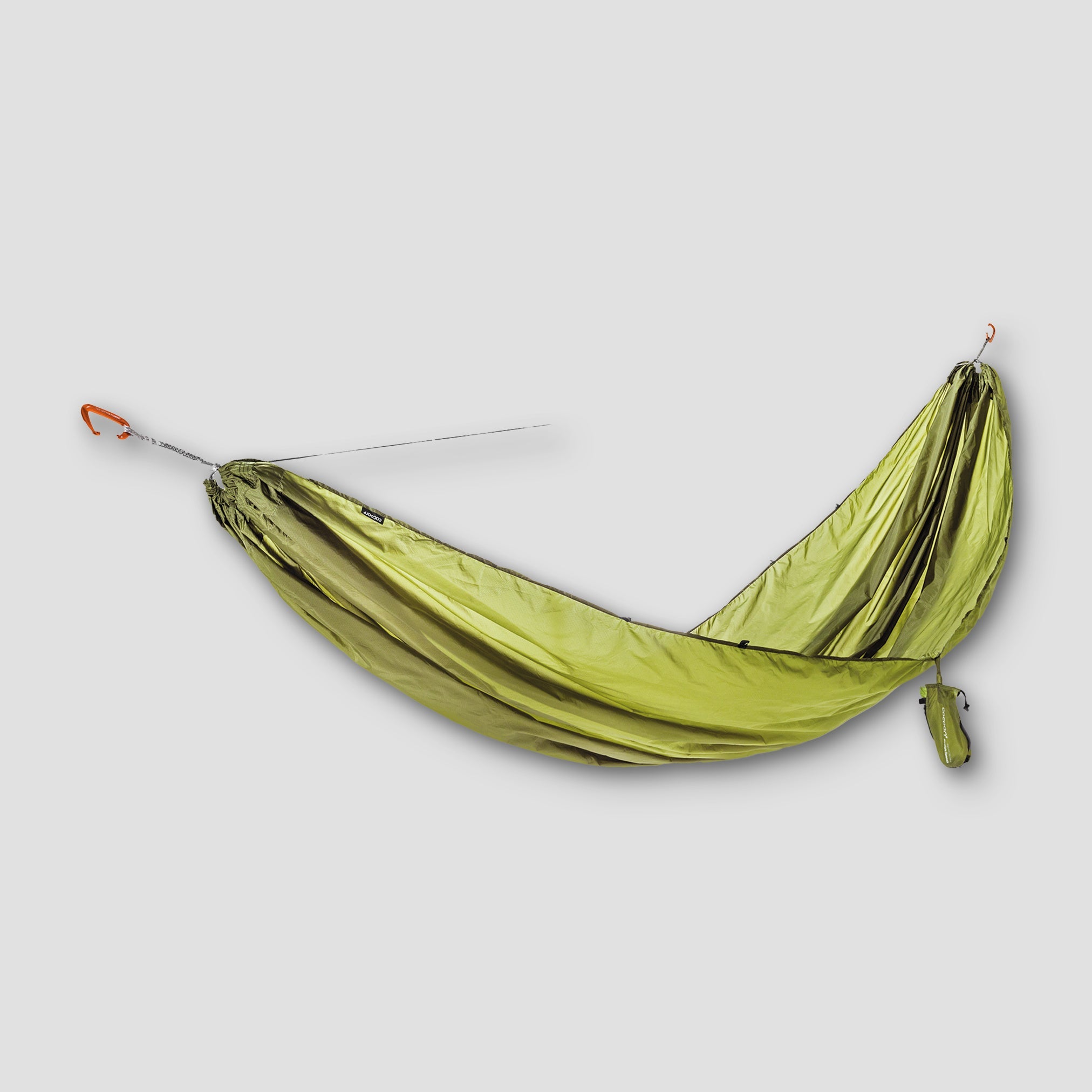 Ultralight COCOON Travel Hammock Single for outdoor camping, shown hanging between trees with a compact, portable design.