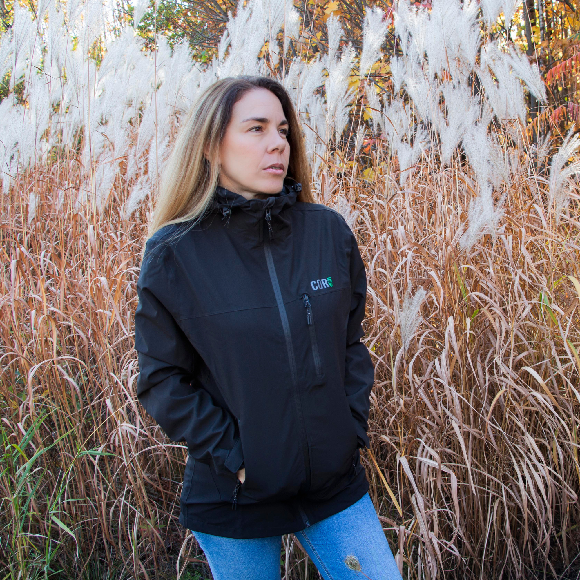 COR Surf Huakai Travel Rain Jacket in unisex style, shown in a sleek waterproof design suitable for outdoor adventures.