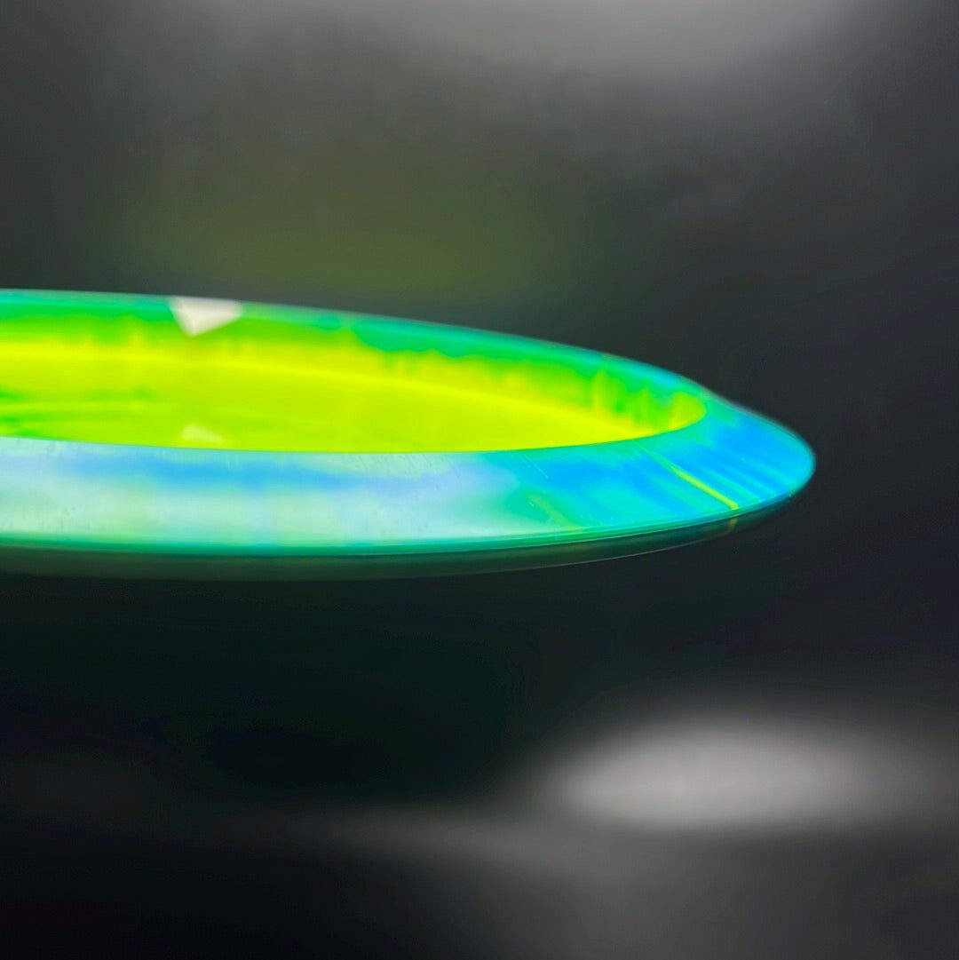 Rare Air Discs Halo S-Blend Exodus disc golf driver with custom RAD Elk stamp, showcasing vibrant design and detailed artwork.