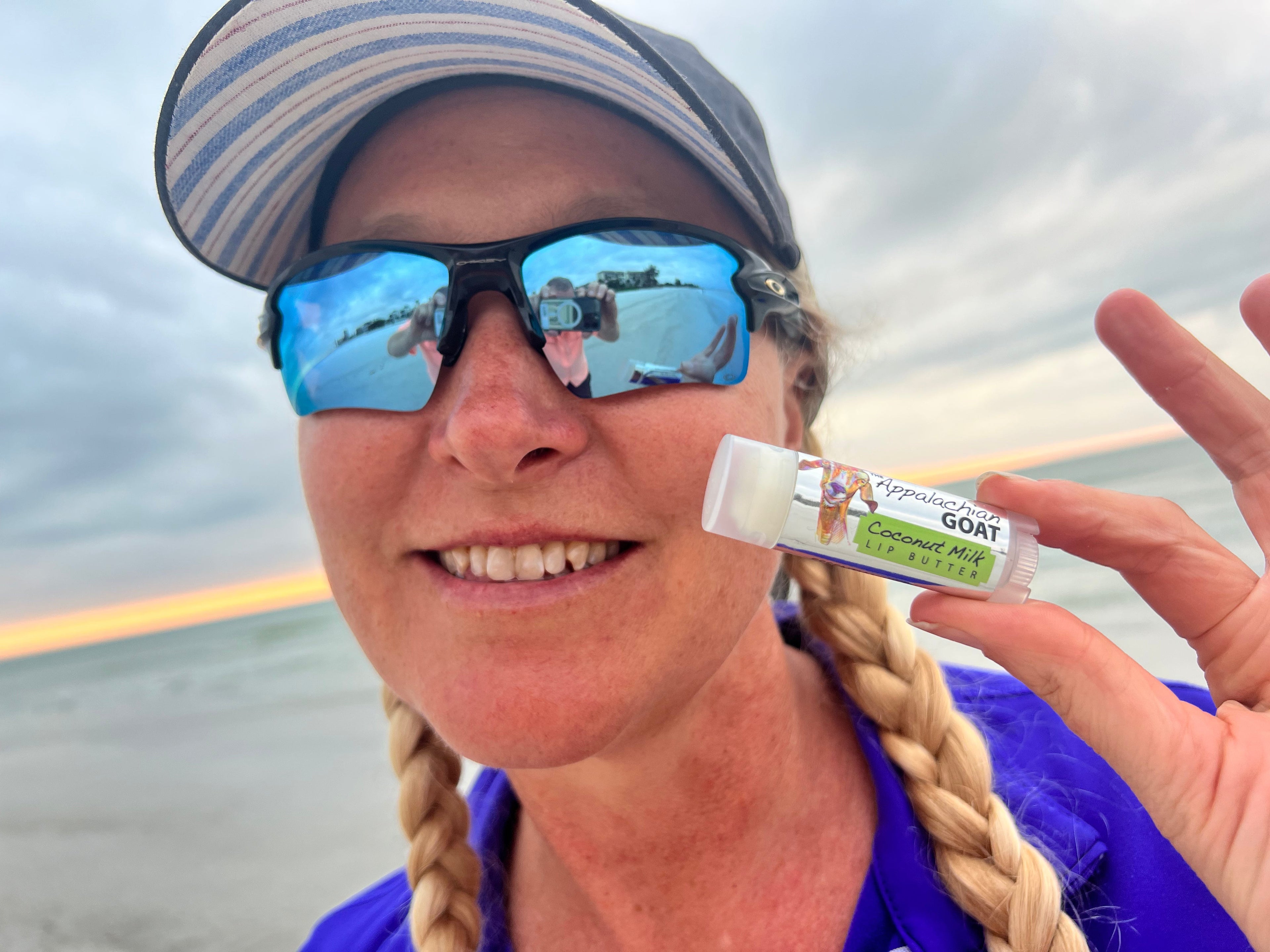 Coconut Milk Luxury Lip Butter by The Appalachian Goat from Essential Journeys, shown in a sleek container with a smooth, creamy texture.