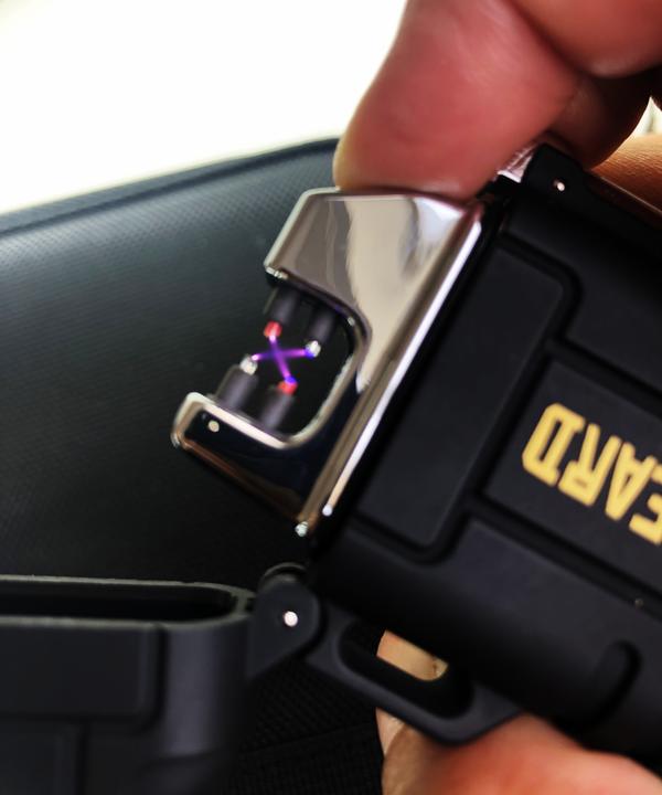 Black Beard Arc Lighter by Alpenglow Readiness Supply designed for outdoor use, showcasing its sleek black design and arc ignition.