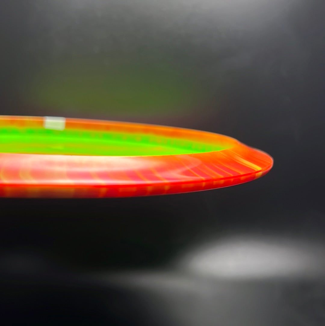 Rare Air Discs Halo S-Blend Exodus disc golf disc with custom RAD Elk stamp, featuring vibrant colors and detailed artwork.