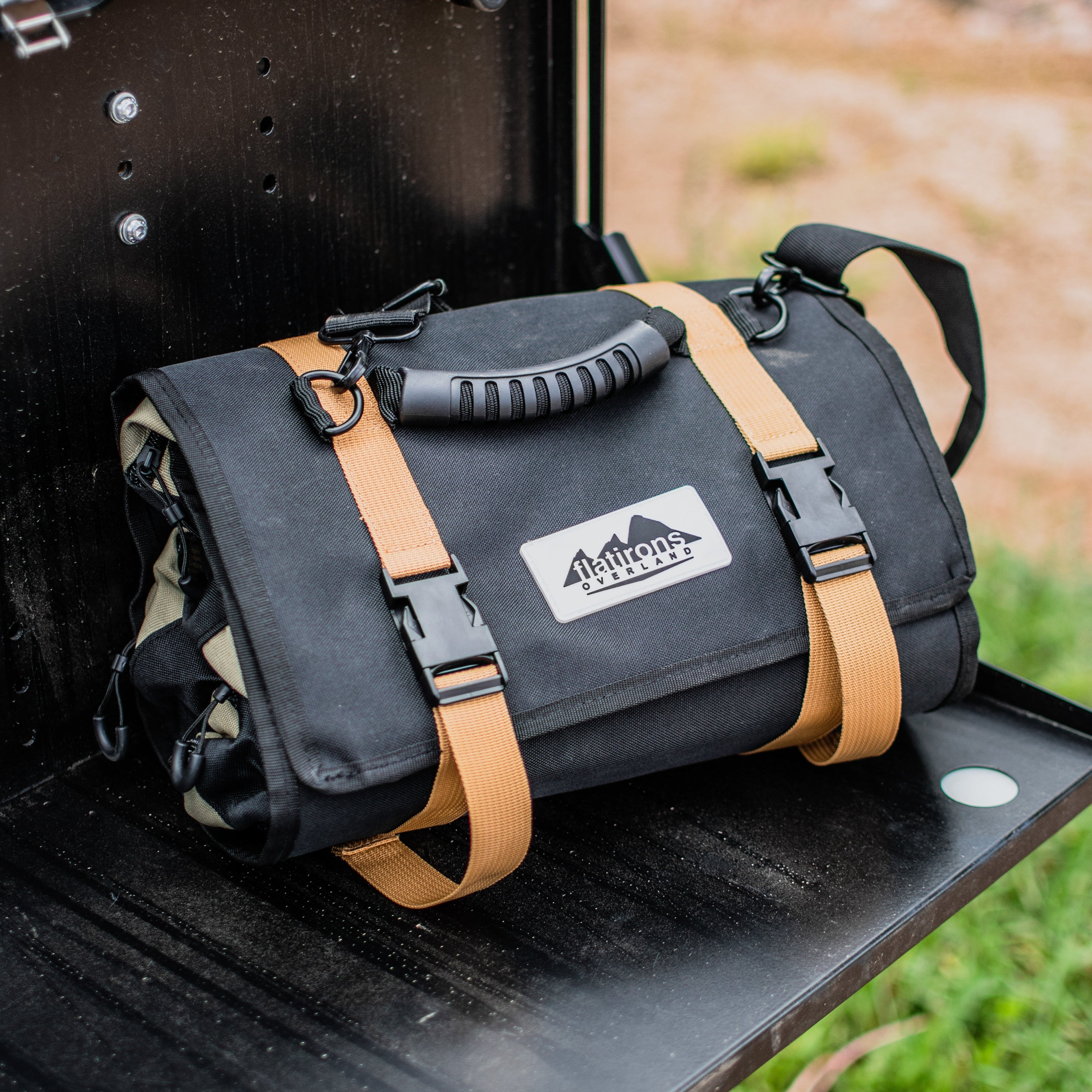 Flatirons Overland RiPouch™ Gear Roll with multiple compartments and straps, designed for organized outdoor gear storage.