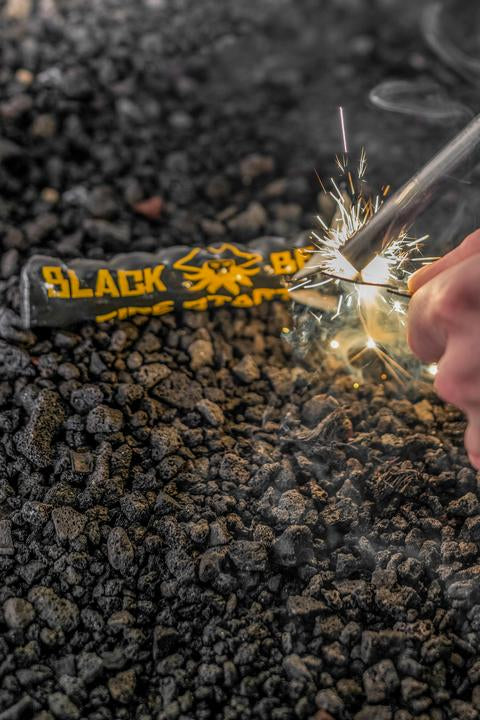Black Beards Ferro Rod by Alpenglow Readiness Supply, close-up of outdoor fire starter tool with textured grip.