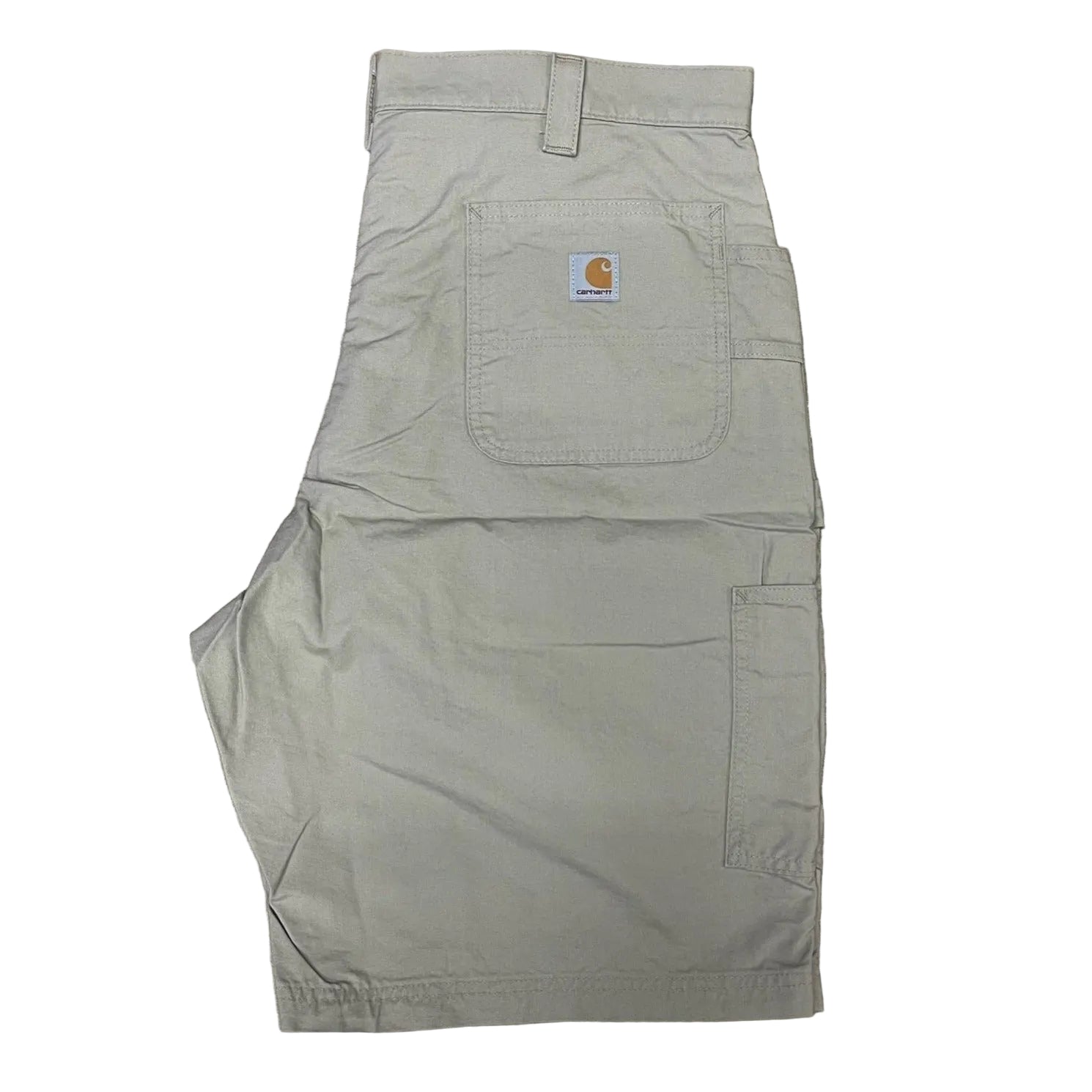 Gray work pants with a Carhartt logo on a wooden floor