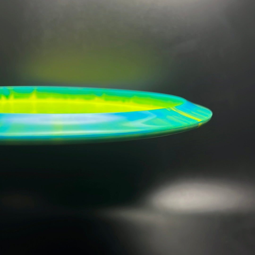 Rare Air Discs Halo S-Blend Exodus disc golf disc with custom RAD Elk stamp, showcasing vibrant colors and detailed artwork.