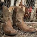 Ariat men's Rambler square toe Western boots with leather finish and Western stitching, displayed on a plain background.