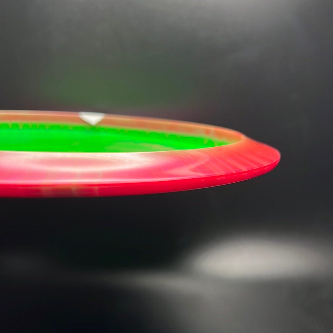 Rare Air Discs Halo S-Blend Exodus disc golf disc with custom RAD elk stamp, featuring vibrant colors and detailed artwork.