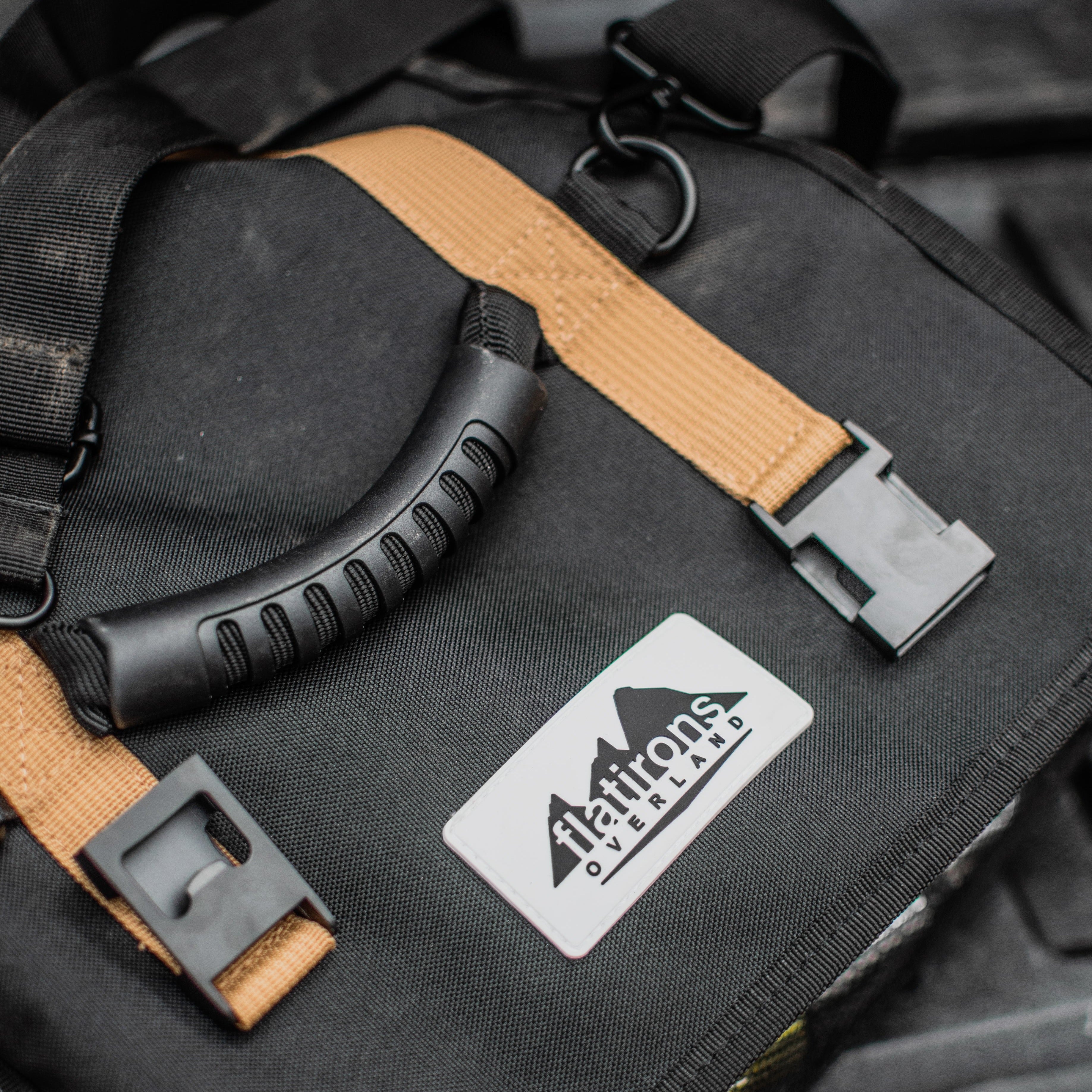 Flatirons Overland RiPouch™ Gear Roll with multiple compartments and durable fabric, suitable for organizing outdoor gear.