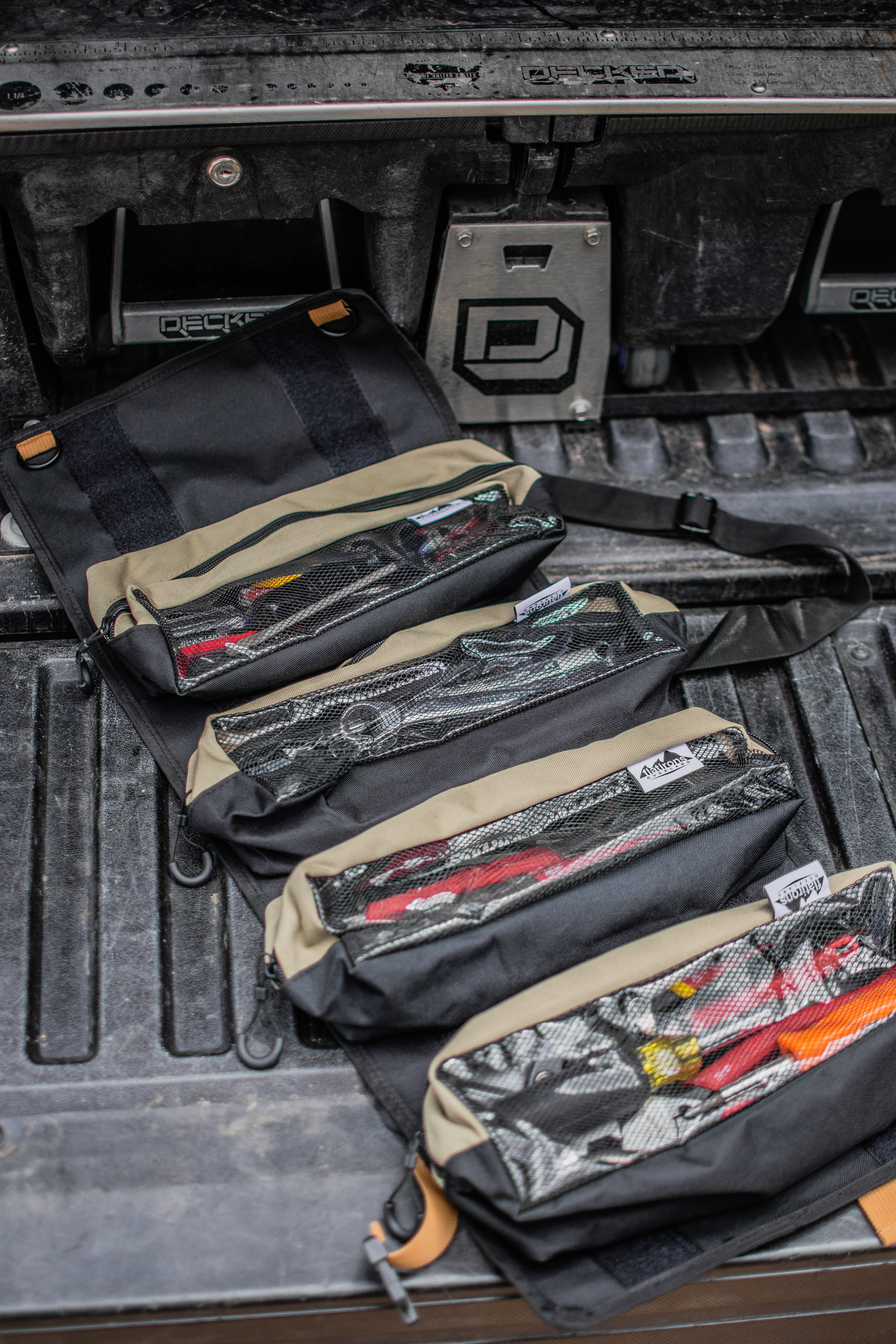 Flatirons Overland RiPouch™ Gear Roll with multiple compartments and straps, designed for organizing outdoor gear.