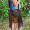 Scarlett Calf Hair Tote by Ariat, stylish wallet with brown and black calf hair design, featuring multiple card slots and a zipper closure.